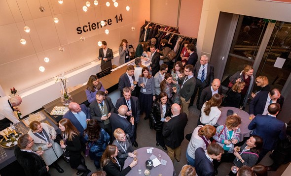 Overhead shot of Science Europe event networking session on their premises