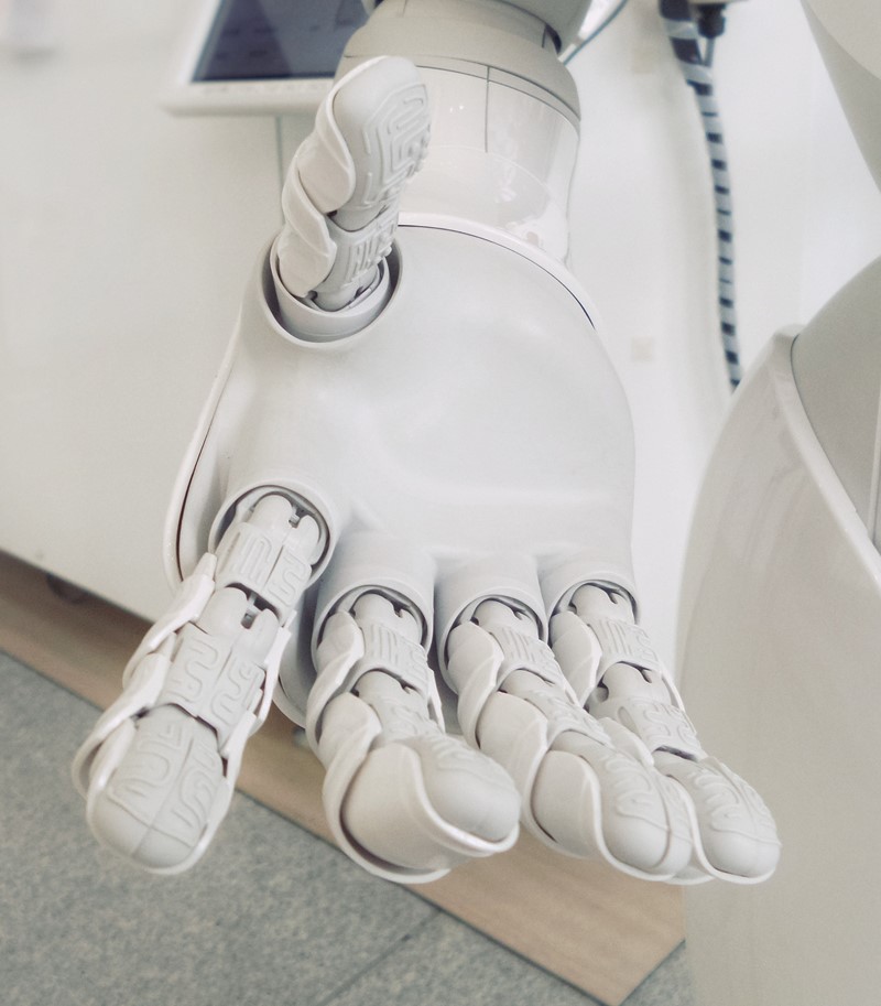 Close up of a white robotic hand