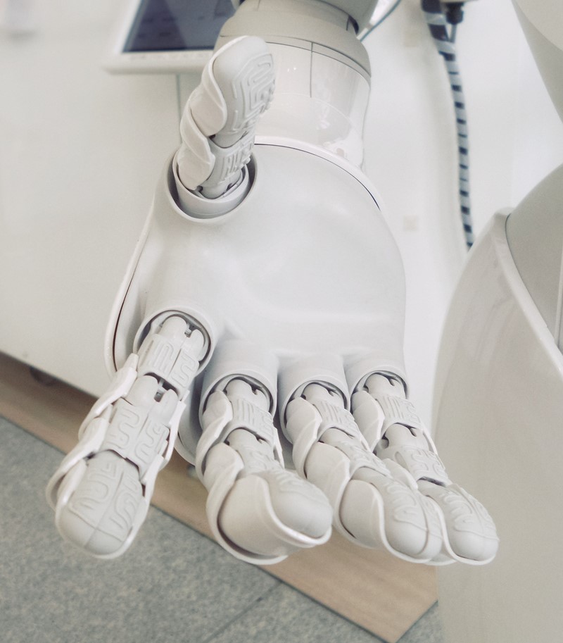 Close up of a white robotic hand