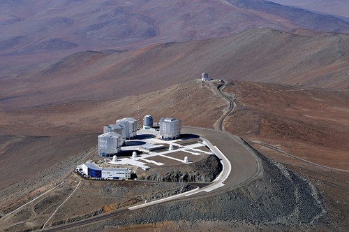 Aerial image showing several high-tech buildings in a rocky desert